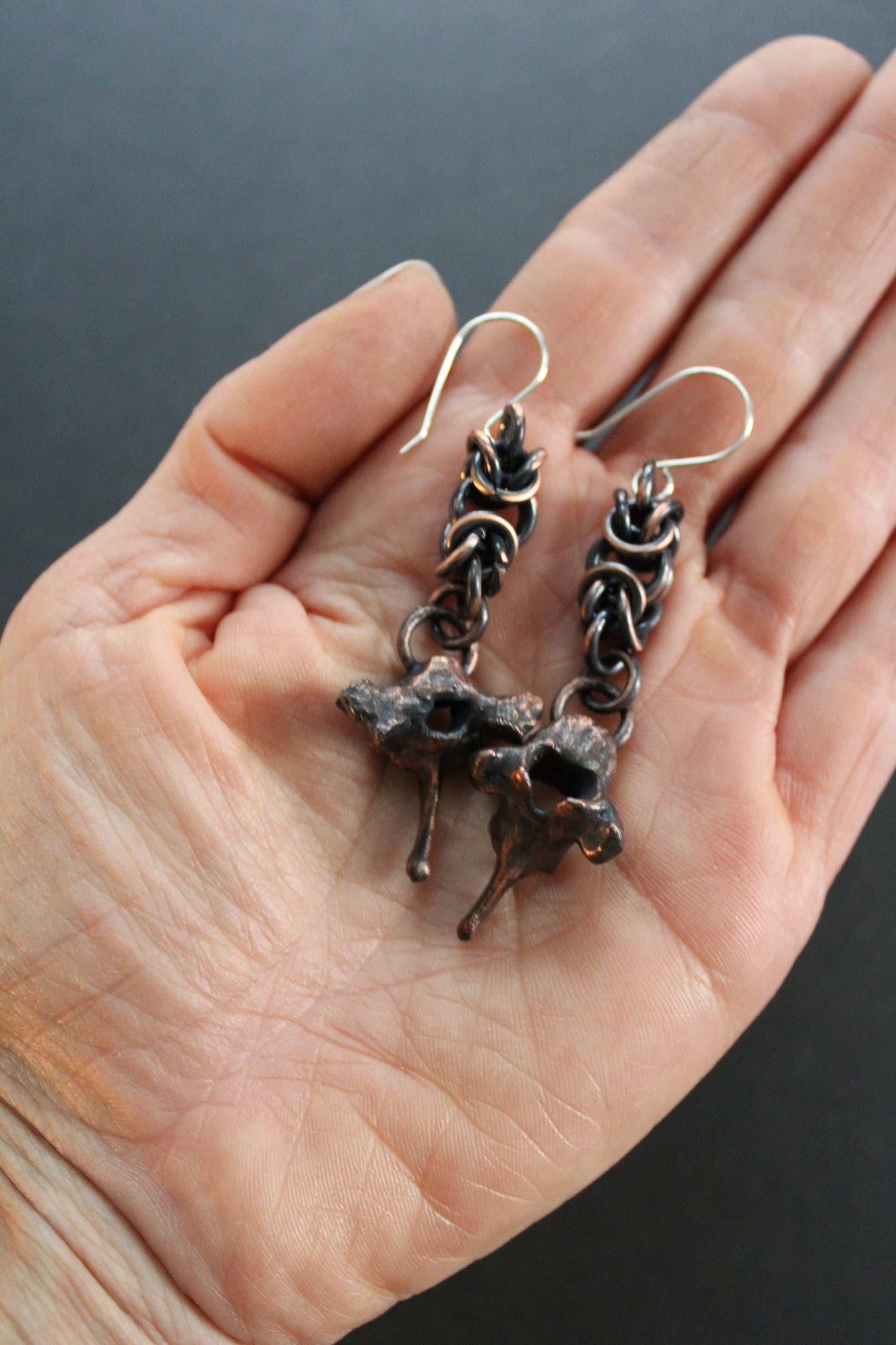 real bone jewelry, real bone earrings, ethically sourced bone earrings, raccoon vertebrae, copper electroformed jewelry